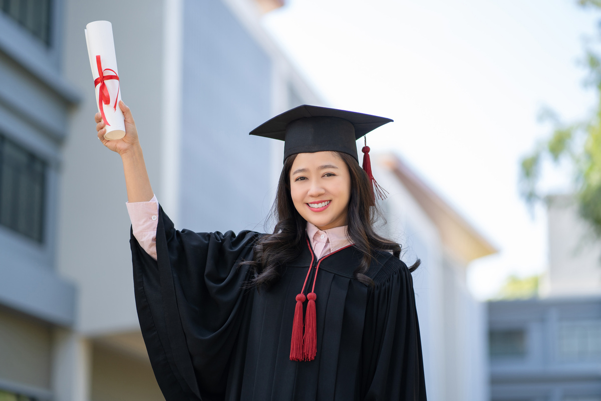 Graduation Concept. Graduated Students on Graduation Day.